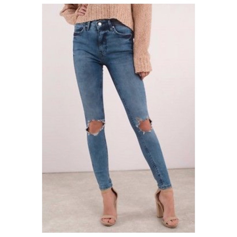 Free people turquoise high rise busted knee jeans.